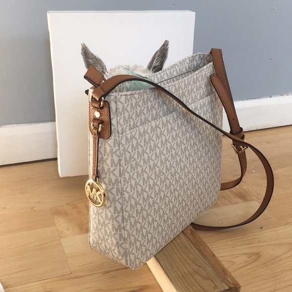 Michael Kors Handbags - Authentic Cross body Michael kors bag